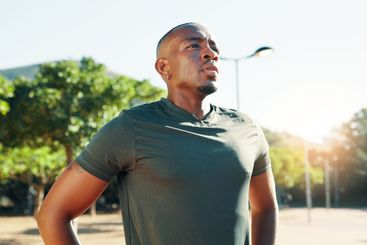 Outdoor, black man and fitness with thinking for rest,...