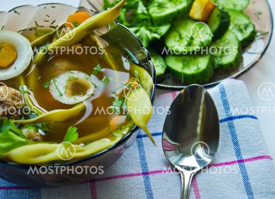 Closeup dishes with haricot soup