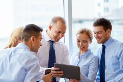 business people with tablet pc computer at office