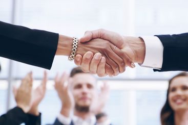 Closeup, handshake and business people in office,...