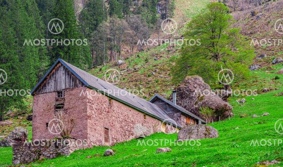 Traditional wall stone stable and house