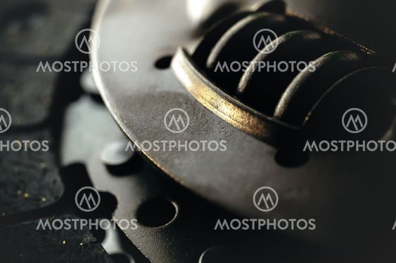 Car clutch on a metal surface