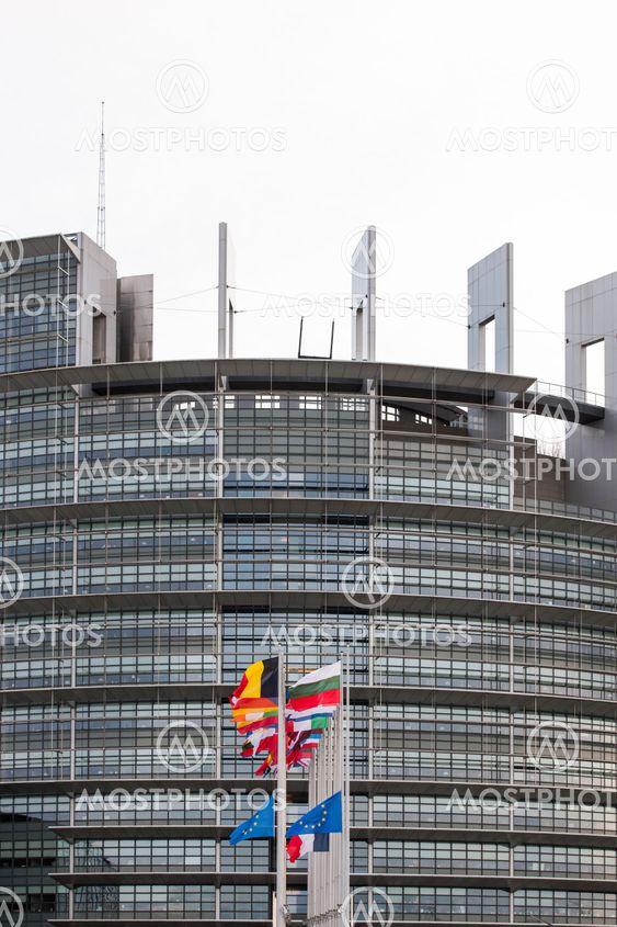 European Union Flags and France flag flies at half-mast