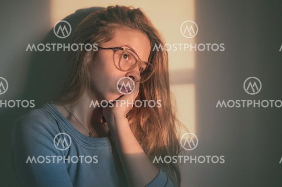 A woman sitting alone and depressed