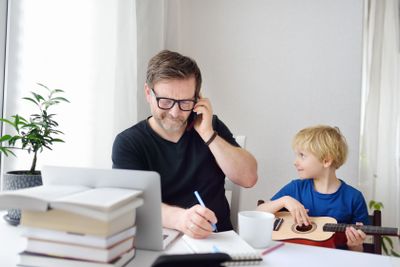 Man working from home with laptop during quarantine....