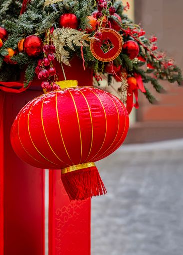 Red lantern decorate a festive street scene during Lunar...