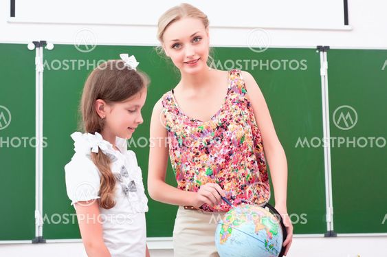 teacher explains the lesson in geography