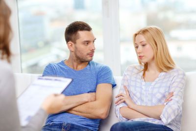 young couple with a problem at psychologist office