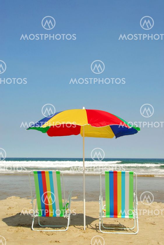 Beach chairs and umbrella