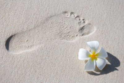 Footprint on white sand