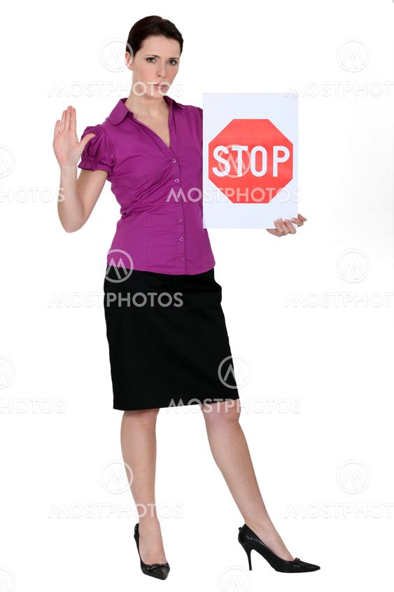 Smart woman with a stop sign