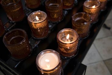 Religious and Christian objects and candles on the...