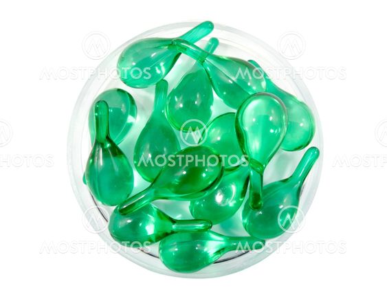 Hair vitamin serum capsule in container