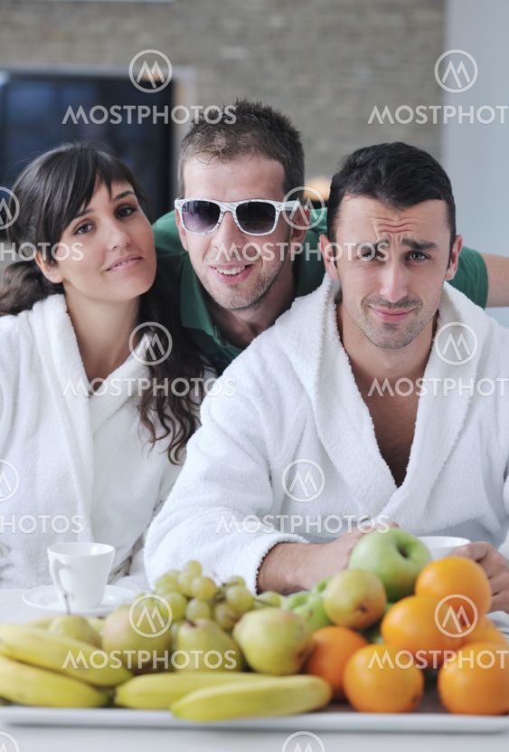 young couple have fun in modern kitchen