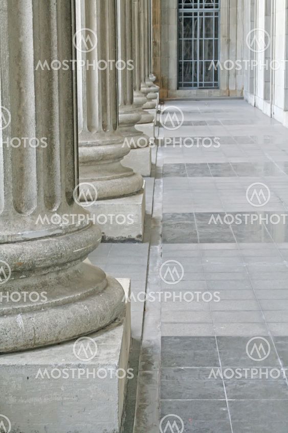 Law and order pillars outside a courthouse