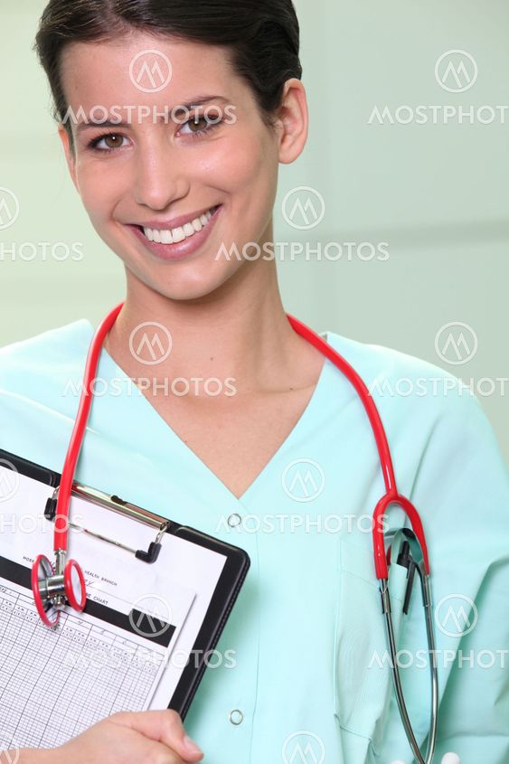 beaming nurse in surgical unit