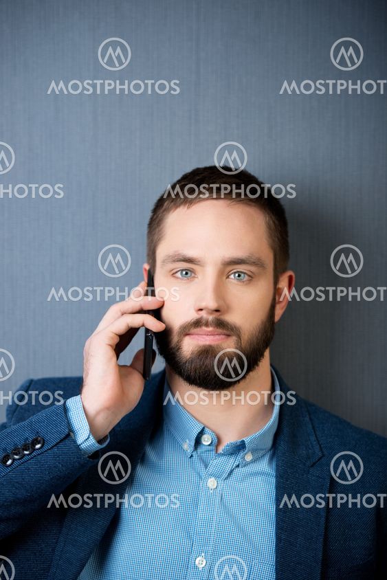 Serious Businessman On Call