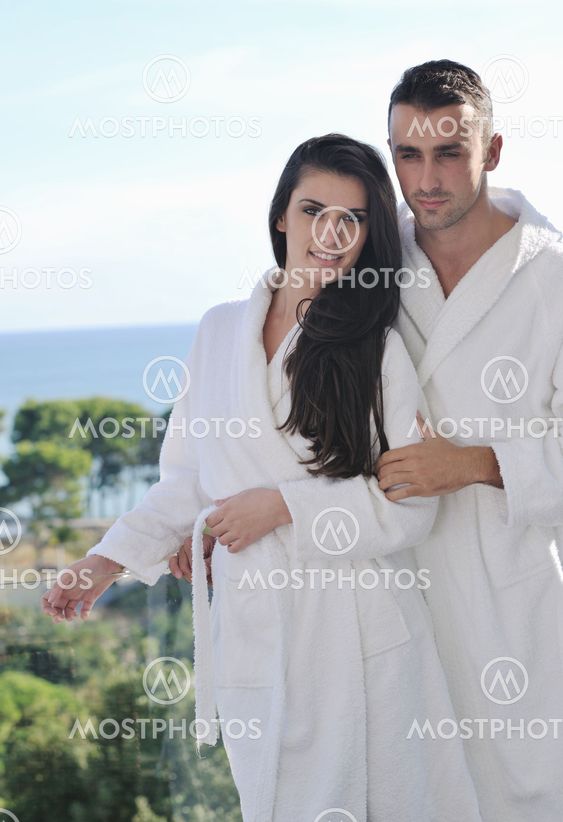 couple relaxing on balcony