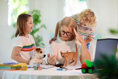 Mother working from home with kids. Quarantine.