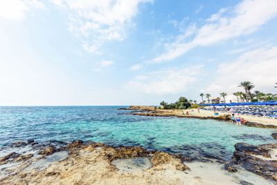 Daylight view to Nissi Beach with colorful bright blue...