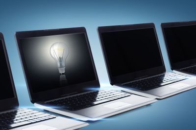 many laptop computers with blank black screens