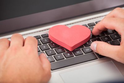 Man Dating Online On Laptop