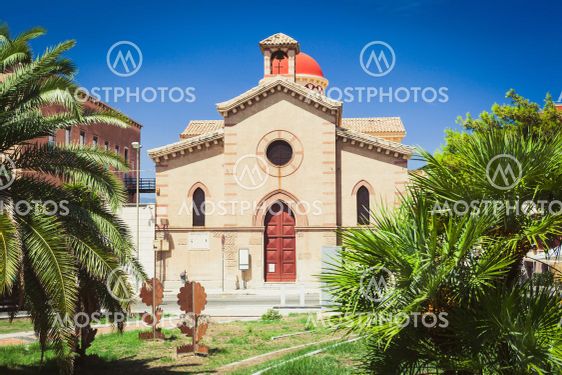 Ottimati Church in Reggio Calabria among green palms