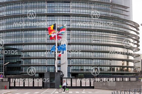 European Union Flags and France flag flies at half-mast