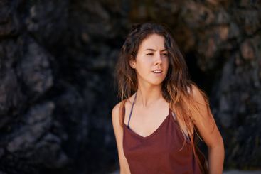 Rocks, woman and travel with vacation, thinking and...