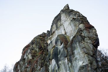 Large rocky rocks. Rocks of rocks. Gray moss-covered rocks