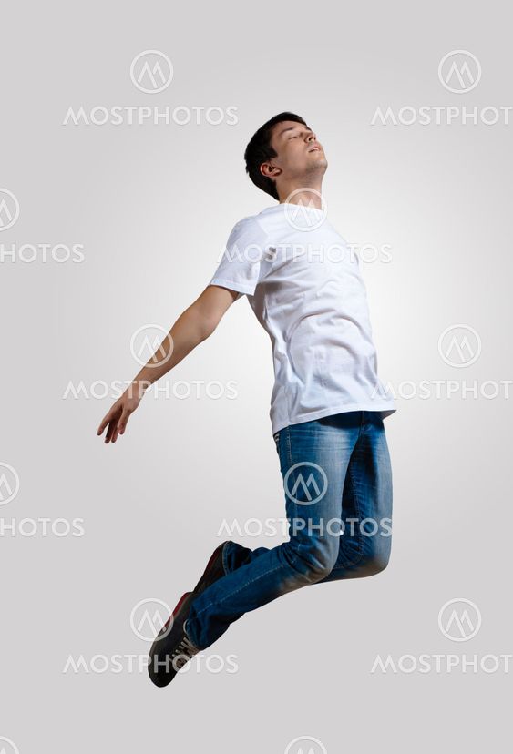 Young man dancing and jumping