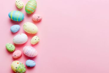 decorative easter eggs on colored background. easter...