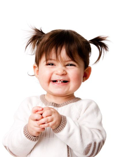 Happy laughing baby toddler girl