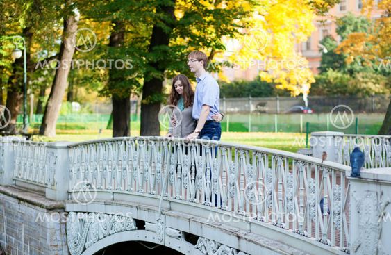 Romantic loveing couple on a bridge