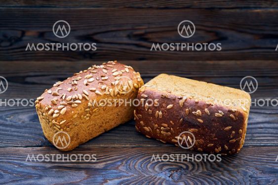 Homemade bread on dark wooden table