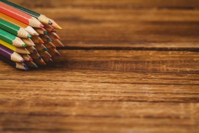 Colour pencils on desk with copy space