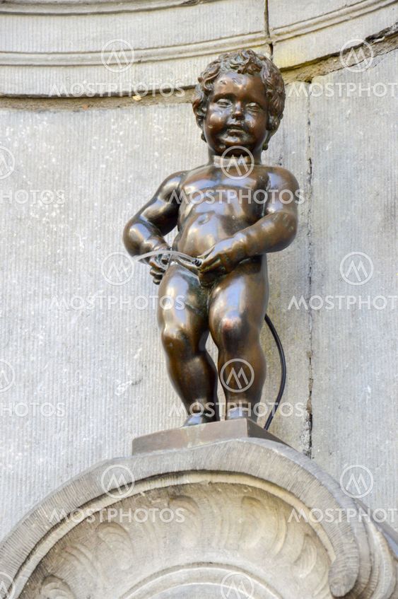 Manneken Pis or Little Man Pee, a landmark small bronze sculpture designed by Hiëronymus Duquesnoy the Elder, located near Grand Place in the city of Brussels, Belgium
