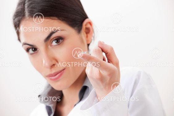 Female Optometrist With Contact Lens