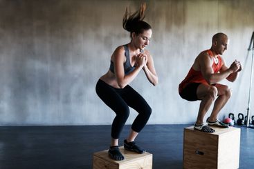 Reach your beast mode. Shot of a man and woman training...