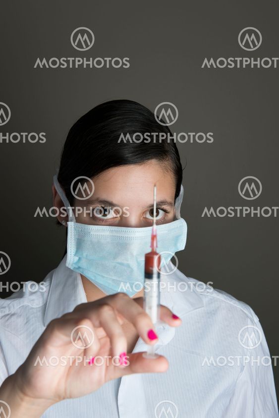 Beautiful women holding syringe
