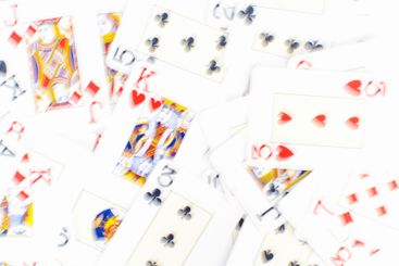 Poker game set of cards and chips close up