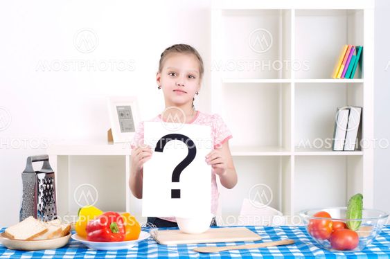 girl holding question sign