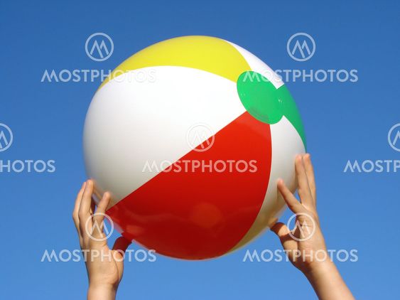 hands with beach ball