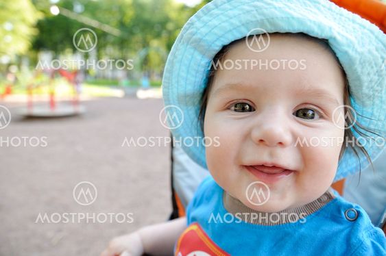 Portrait very happy baby in hat