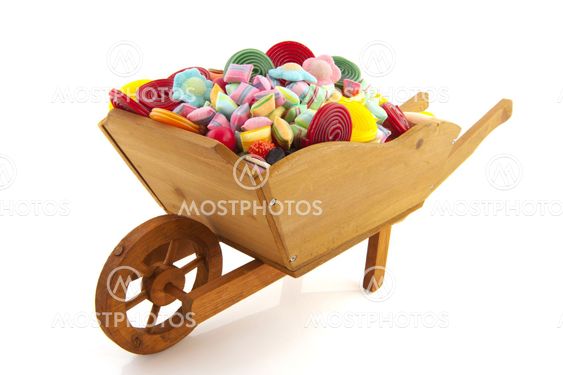 wheel barrow full with candy