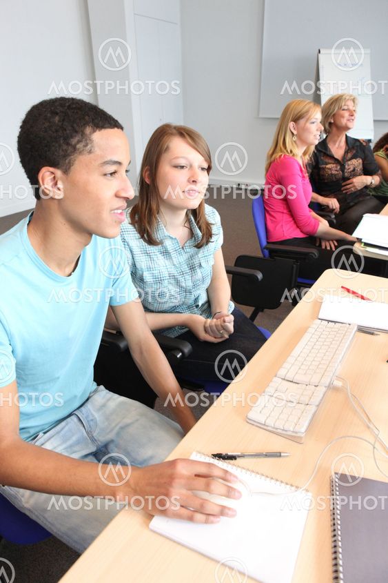 Teens in computer class
