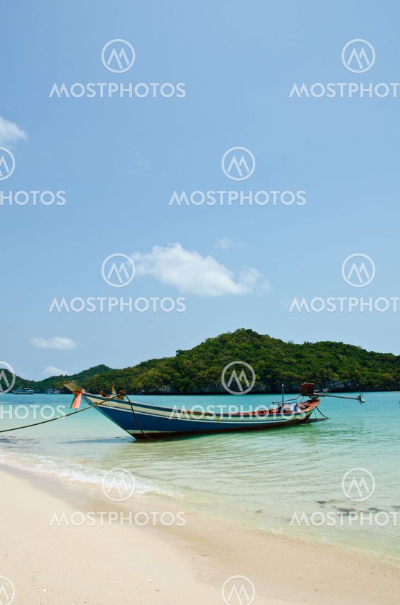 long tail boat on the beach