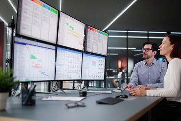 Professional woman using Kanban project management software