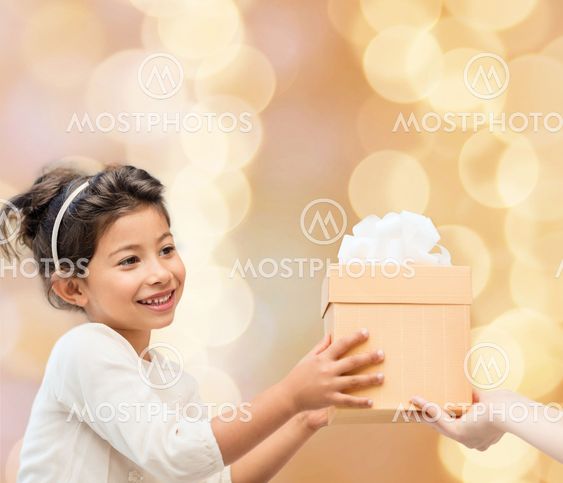 smiling little girl with gift box