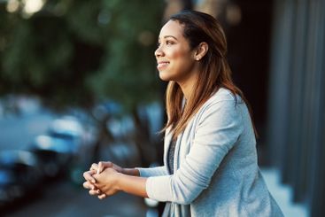 Balcony, thinking or businesswoman in office with smile...